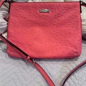 This is a Kate Spade Elyse Expandable Ostrich Leather Crossbody Bag